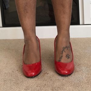 Never Worn!!! Red patent leather pump.